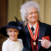 Habla esposa de Brian May sobre la recuperación del guitarrista luego de derrame cerebral